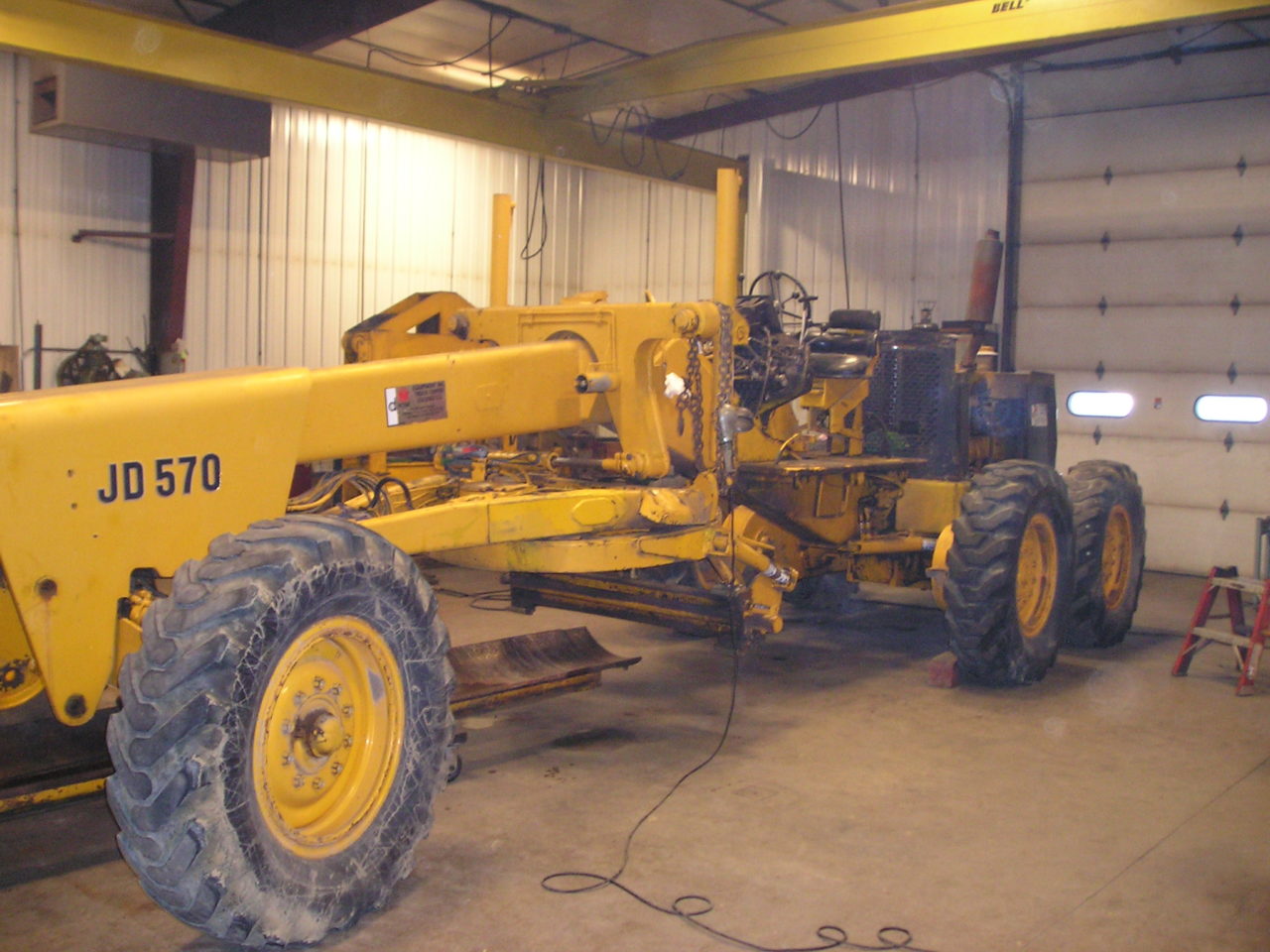Don and Jerry spent a total of 2,200 hours from December 2014 to December 2015 restoring the JD570 Motor Grader.